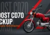 Red 70cc commuter motorcycle demonstrating a performance setup for boosting Honda CD70 pickup without internal engine modifications.